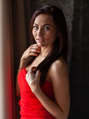 Michaela Isizzu Looks Sensational In A Red Dress That Hugs Her Sexy Curves