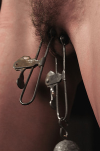 Kaitlyn Katsaros Is Bound Face Down On The Table Leaving Her Back And Ass Exposed