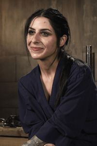 Kaitlyn Katsaros Is Bound Face Down On The Table Leaving Her Back And Ass Exposed