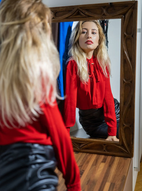 Francheska Admiring Herself In The Mirror