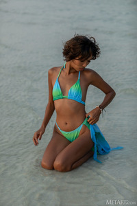 Rosah Asian Babe Lets The Waves Tease At Her Ankles