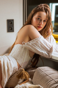 Asia B Offer A Tempting Rear View Of Her Peachy Bottom