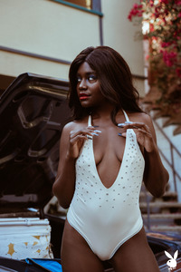 Victoria Antoinette Poses Alongside A Classic Car With Naked Body