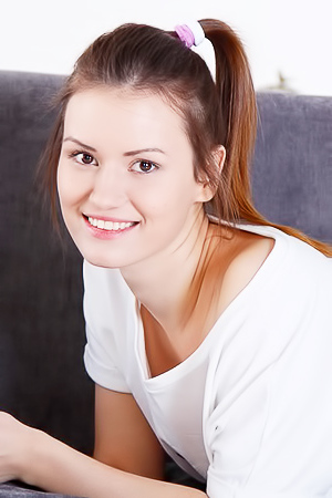 Curvy Brunette Masturbates While Reading A Book In Arm-chair