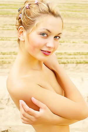 pretty Sweet Lilya shows off her nude body outside