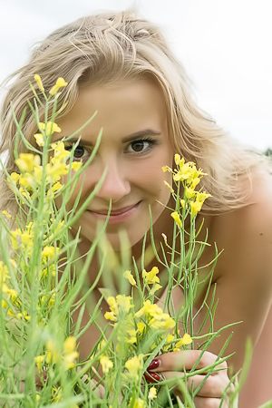 Casey Nature loving teen gets naked in a field of wild flowers