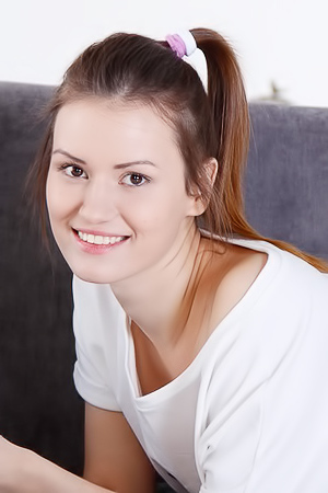 Curvy Brunette Masturbates While Reading A Book In Arm-chair