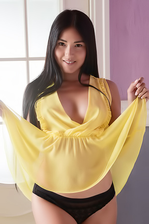 Kimiko Feeling Flirty In Her Sheer Yellow Top