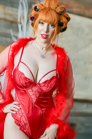 All hail queen Lauren Phillips, because she is the MYLF model of the month. It's a big title for a busty redhead who is still do