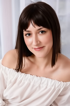 Cora Caressing Her Lovely Breasts Sensuously