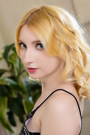 Minnie Lighter Squeezing Her Gorgeous Breasts Sensuously