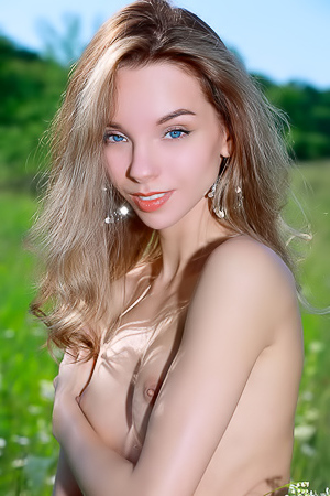 Josephine Jane Thighs Parted To Expose The Delicate Contours Of Her Shaved Pussy