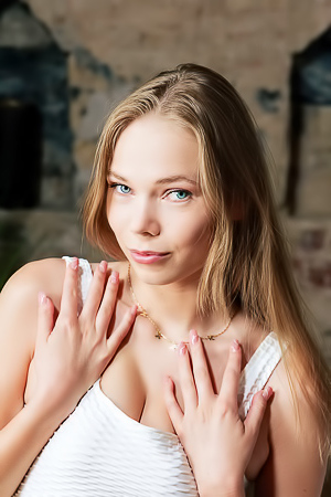 Luise Exposing Her Lovely Breasts And Teasing Her Puffy Nipples Playfully