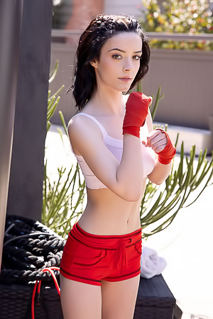 Lilly Redd Her Scarlet Shorts Cling To Her Sexy Booty And Her White Crop Top Turns Transparent