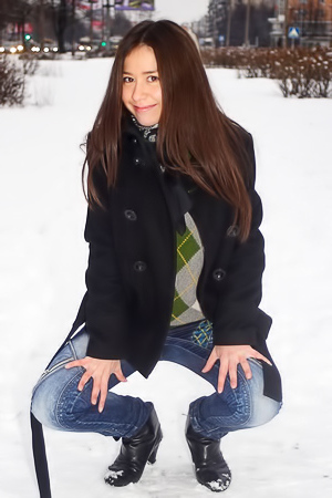 Cute teen in skin tight blue jeans