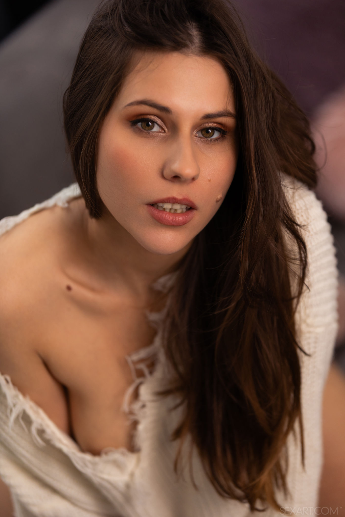 Amber Slassh Teases With Perky Nipples And Spread Legs On The Couch