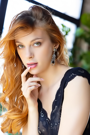 Naty Evans Entices In Revealing Striptease Showcasing Lustful Curves