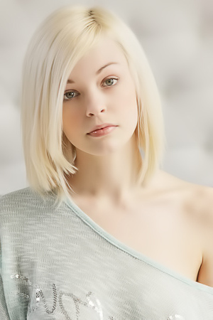 Skinny, platinum-blonde Bree strips